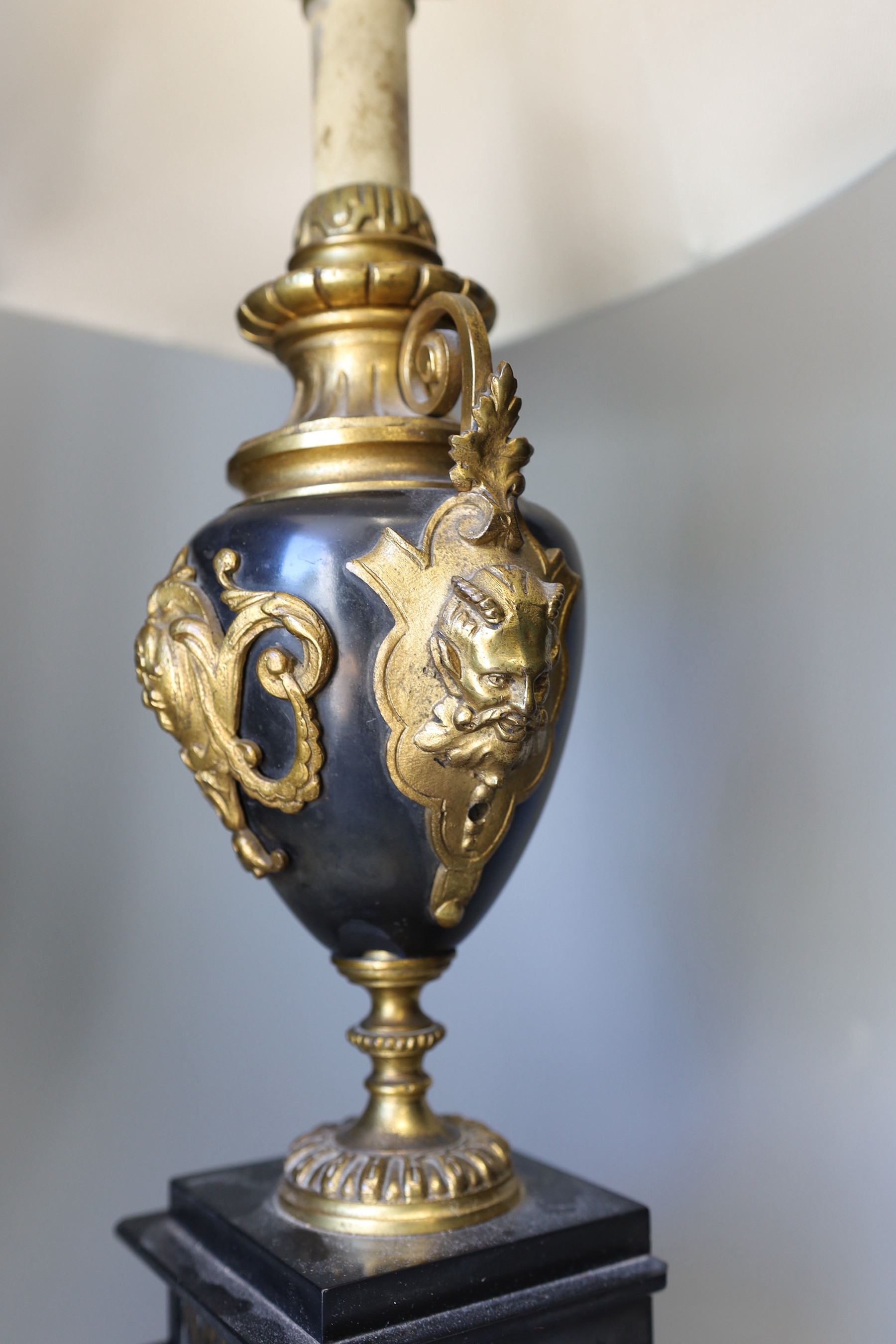 A gilt metal mounted lamp